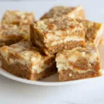 Moist Carrot Cake Bars with Cheesecake Swirl