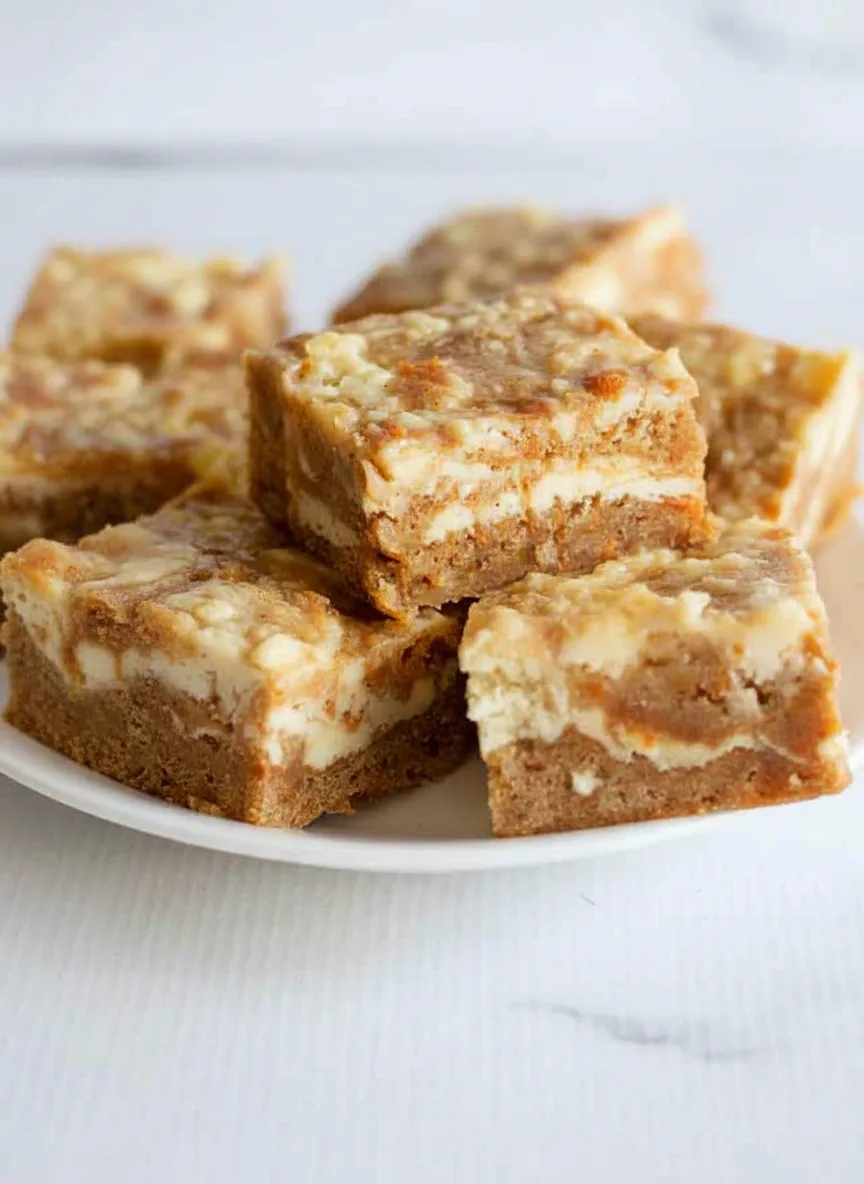 Moist Carrot Cake Bars with Cheesecake Swirl